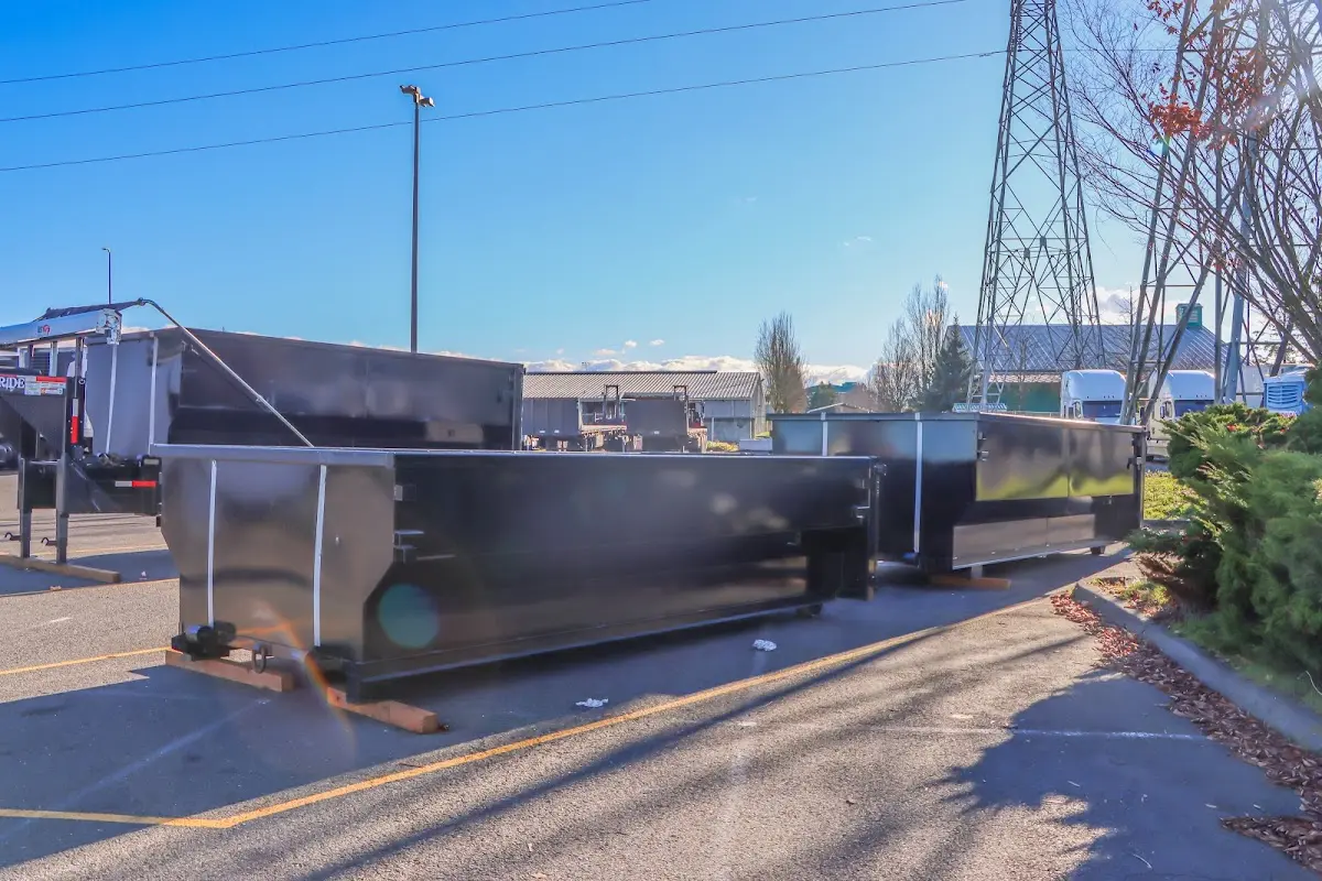 Roll-off dumpster ready for waste disposal at job site for 15 Yard Dumpster Rental in Mandeville
